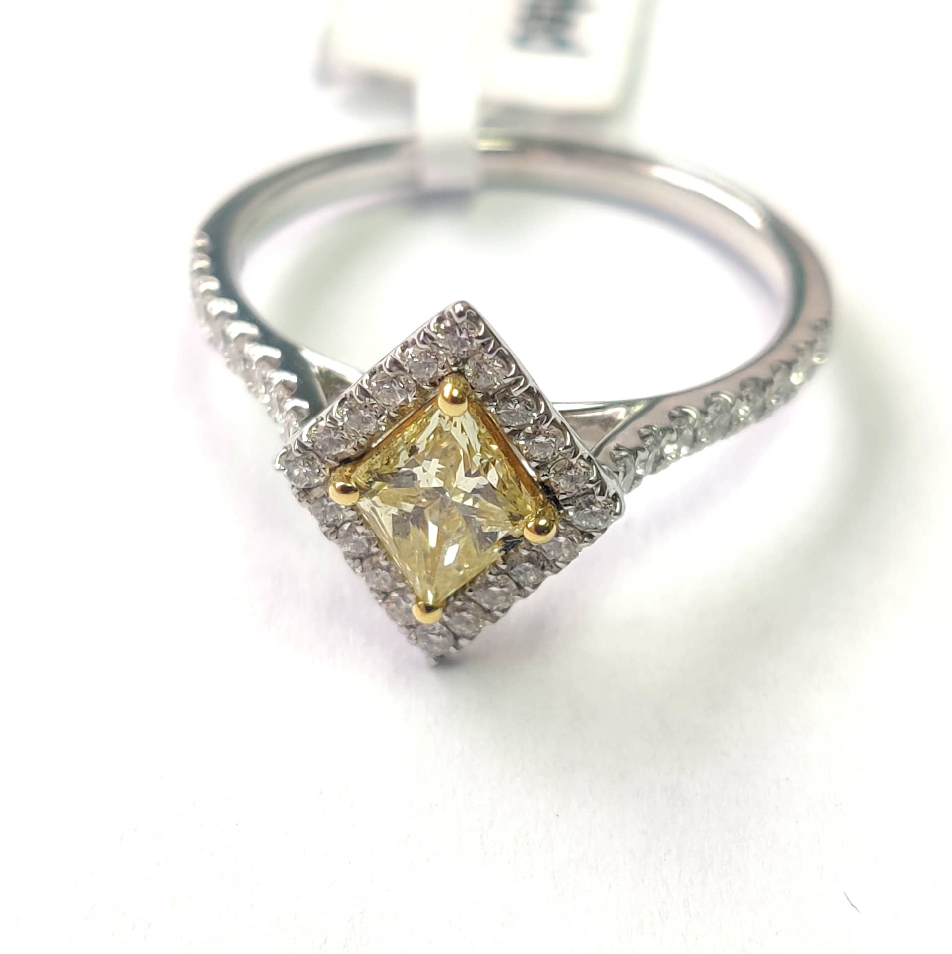 1.00 Ct Fancy Yellow Kite Shape Diamond Halo Engagement Ring Crafted In Platinum