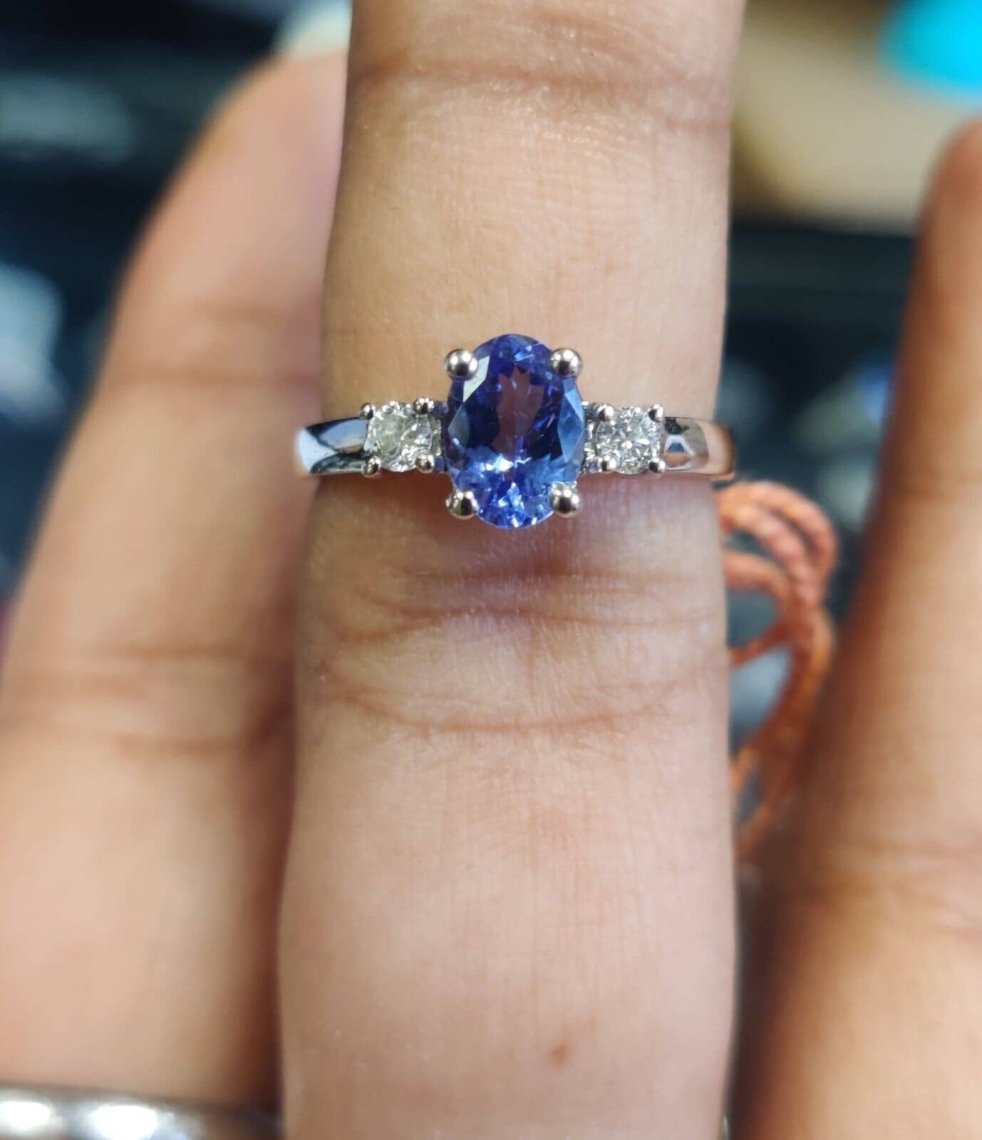 1.00Ct Natural Oval Cut Tanzanite And Round Diamond Ring UK Hallmarked In 18k White Gold