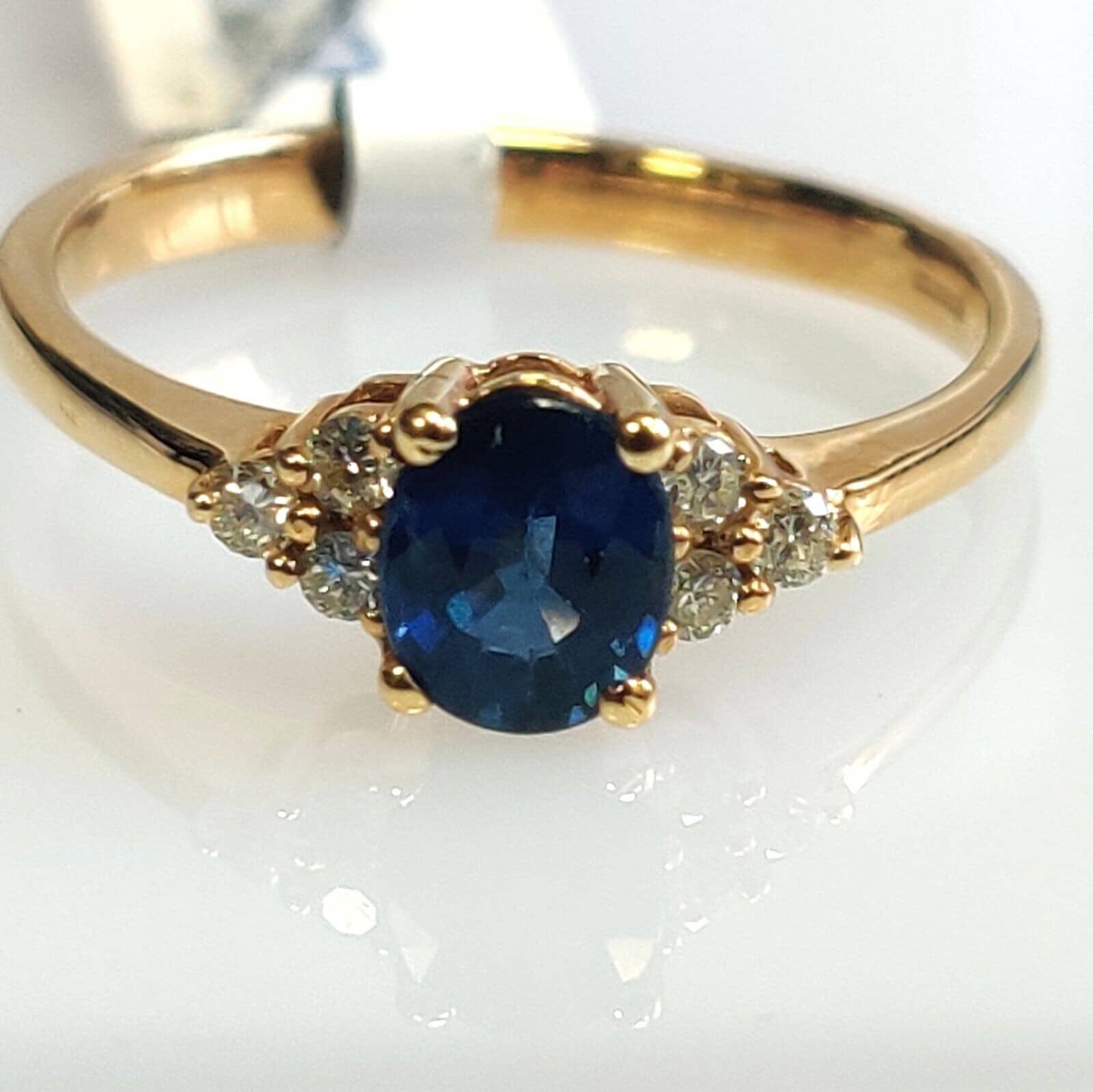 0.90 Ct Oval Cut Natural Sapphire And Round Diamond Ring In 18k Yellow Gold