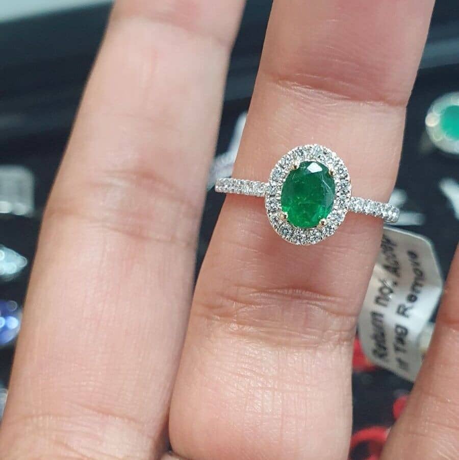 1.50Ct AAA Green Oval Cut Emerald And Round Diamond Halo Ring In Platinum