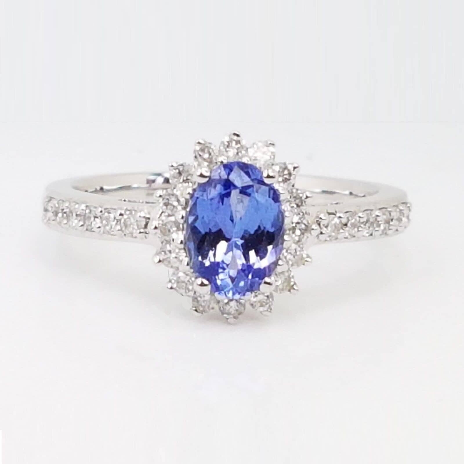 AAA 1.50 Ct Oval Shape Tanzanite and Round Diamond Cluster Ring In 18k White Gold