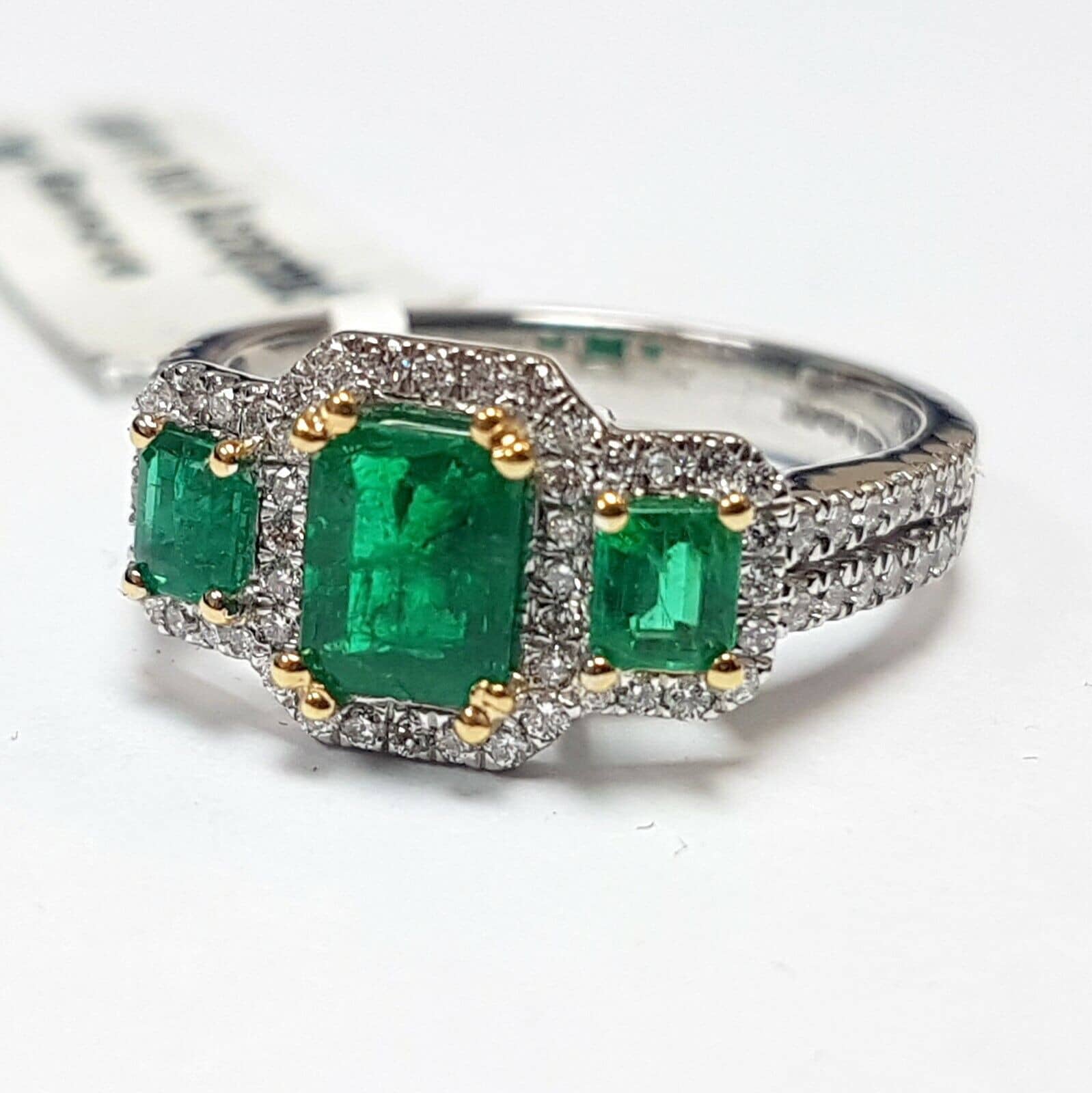 AAA Quality 1.70 Carat Emerald and Diamond Halo Three Stone Ring in Platinum