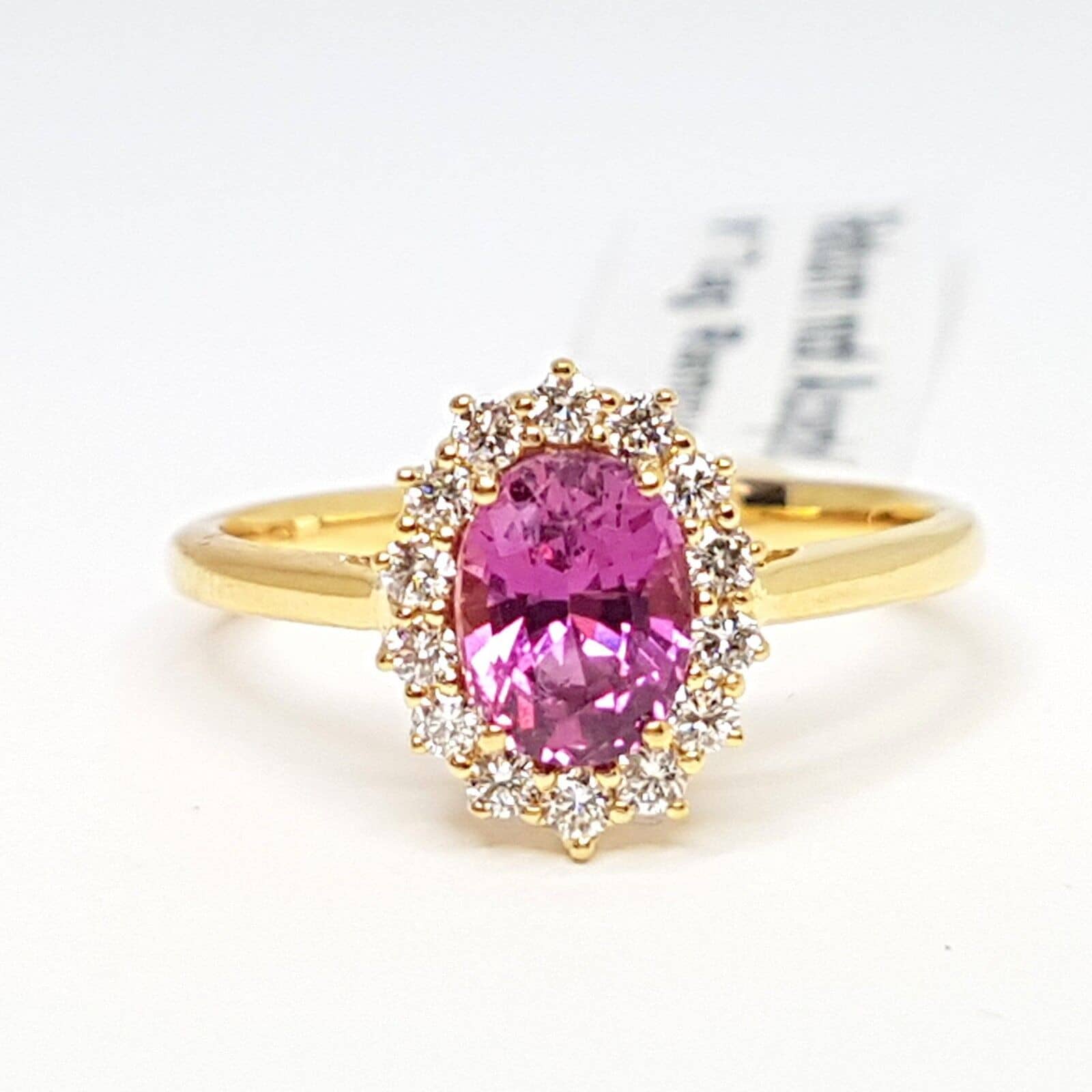 1.50 Ct Pink Oval Shape Sapphire And Round Diamonds Cluster Ring In 18k Yellow Gold