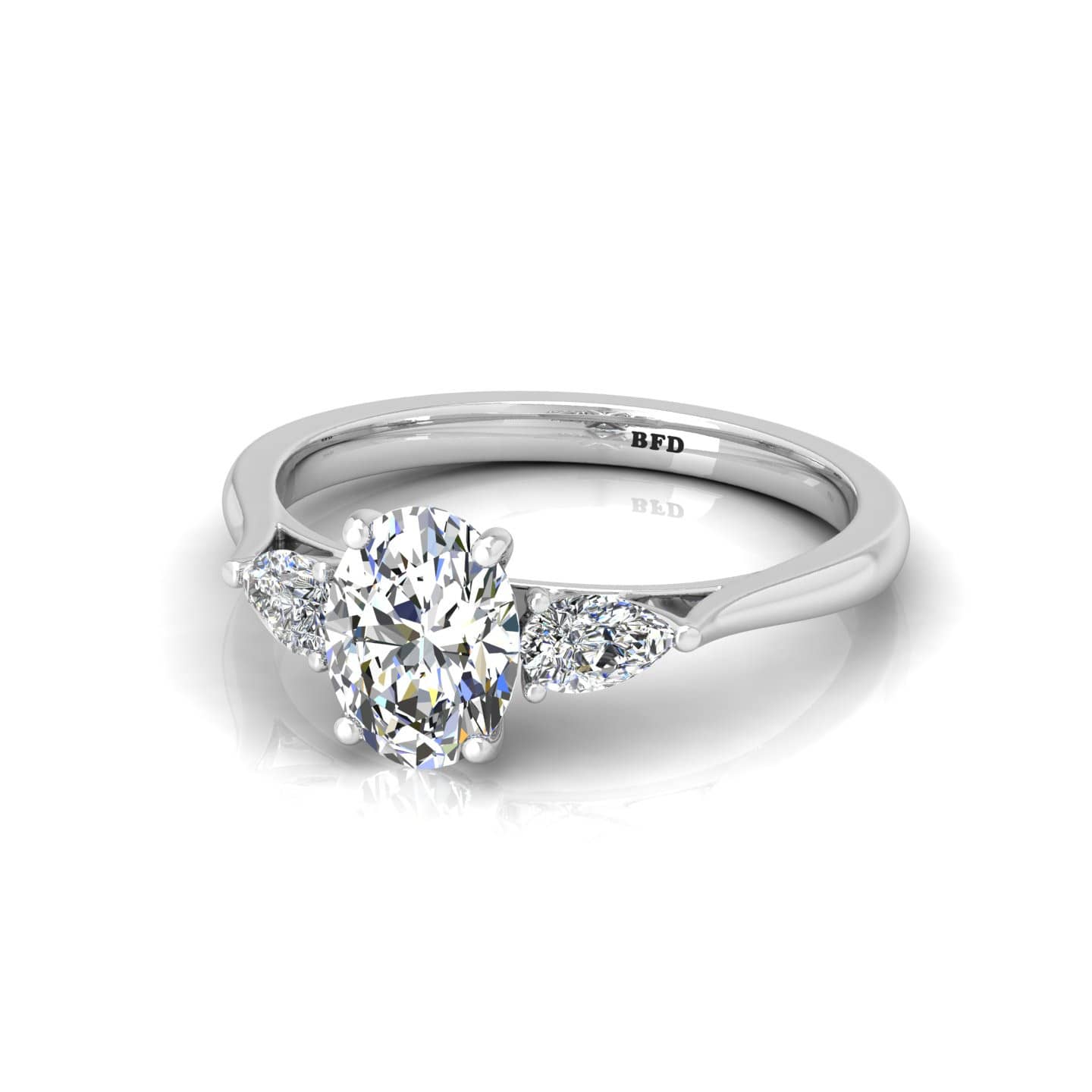 Oval With Side Pear Shape Diamond Three Stone Engagement Ring