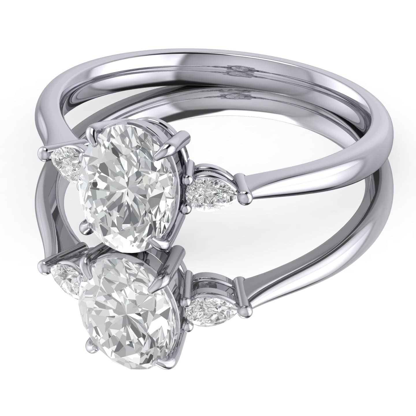 Oval With Pear Shape Diamond Three Stone Engagement Ring