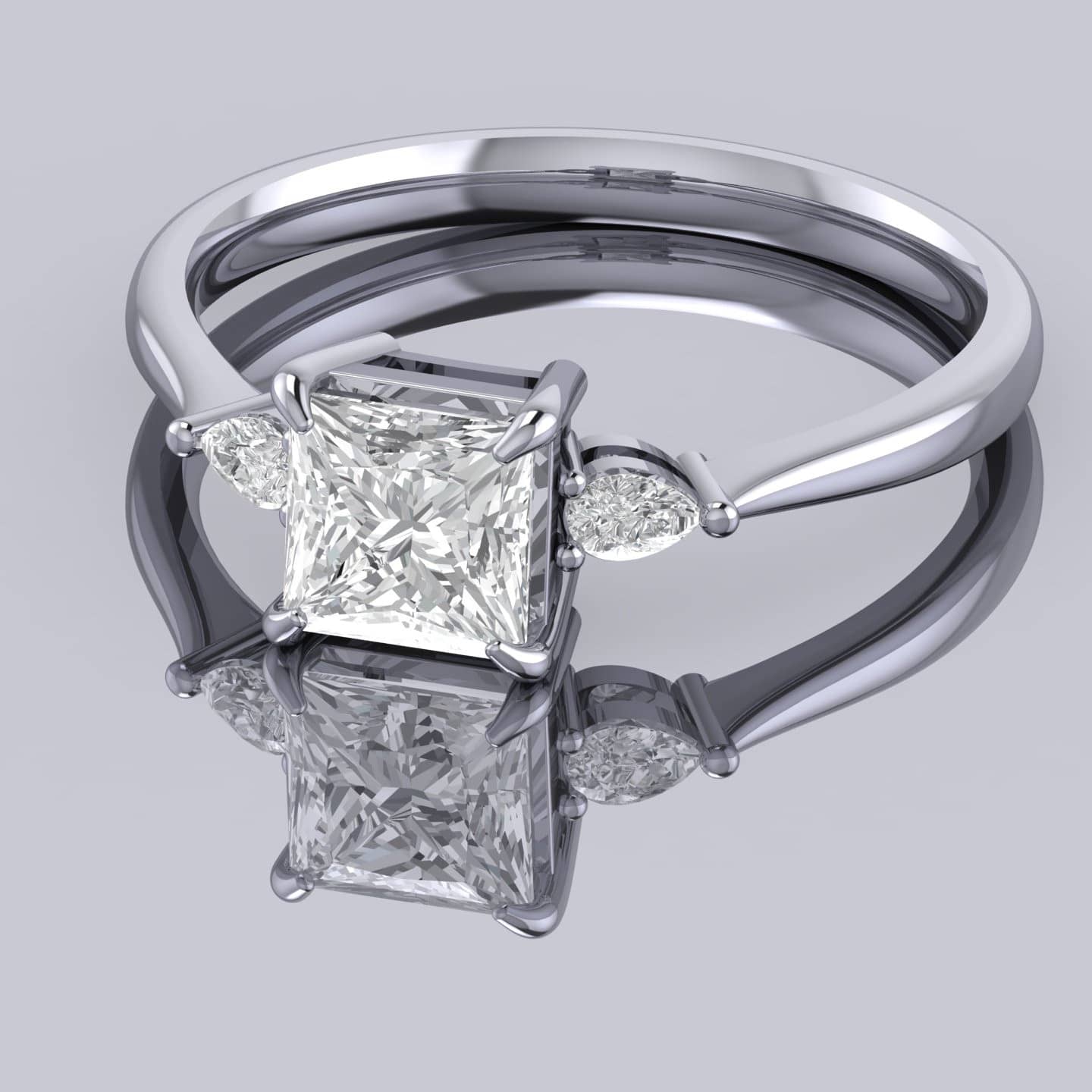 Princess And Pear Diamond Three Stone Engagement Ring