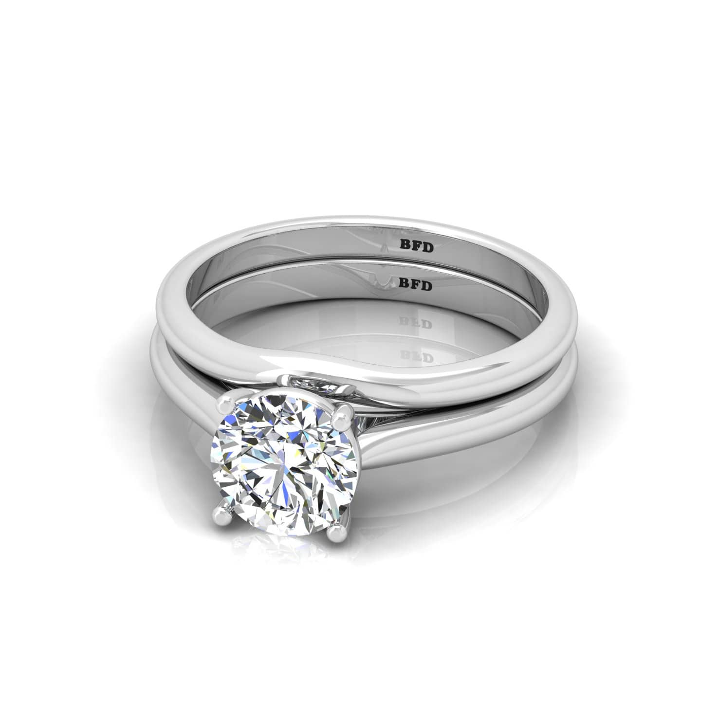 CLAW SET ROUND DIAMOND ENGAGEMENT RING WITH MATCHING BAND