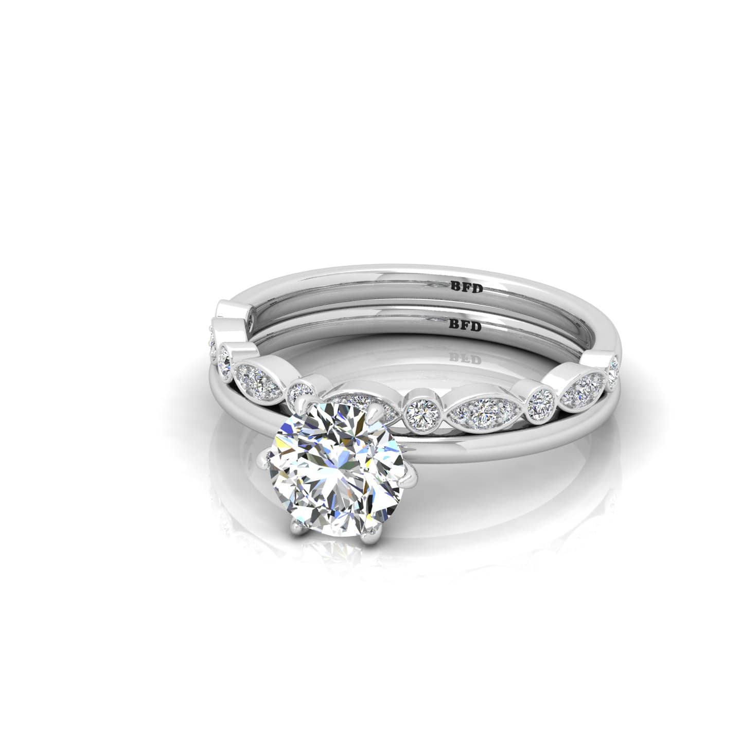 Round Diamond Six Claw Set Engagement Ring With Matching Band