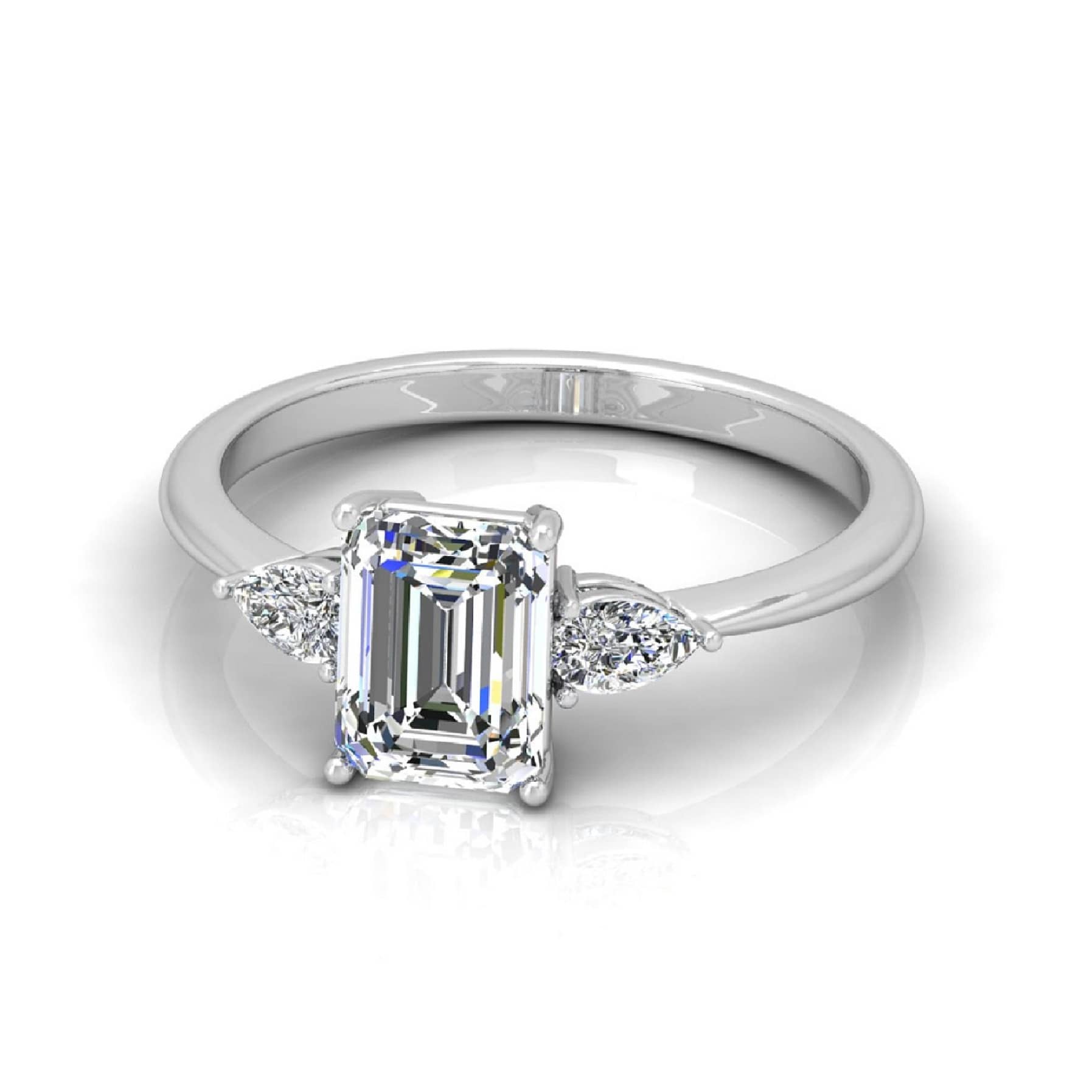 Emerald And Pear Diamond Three Stone Engagement Ring