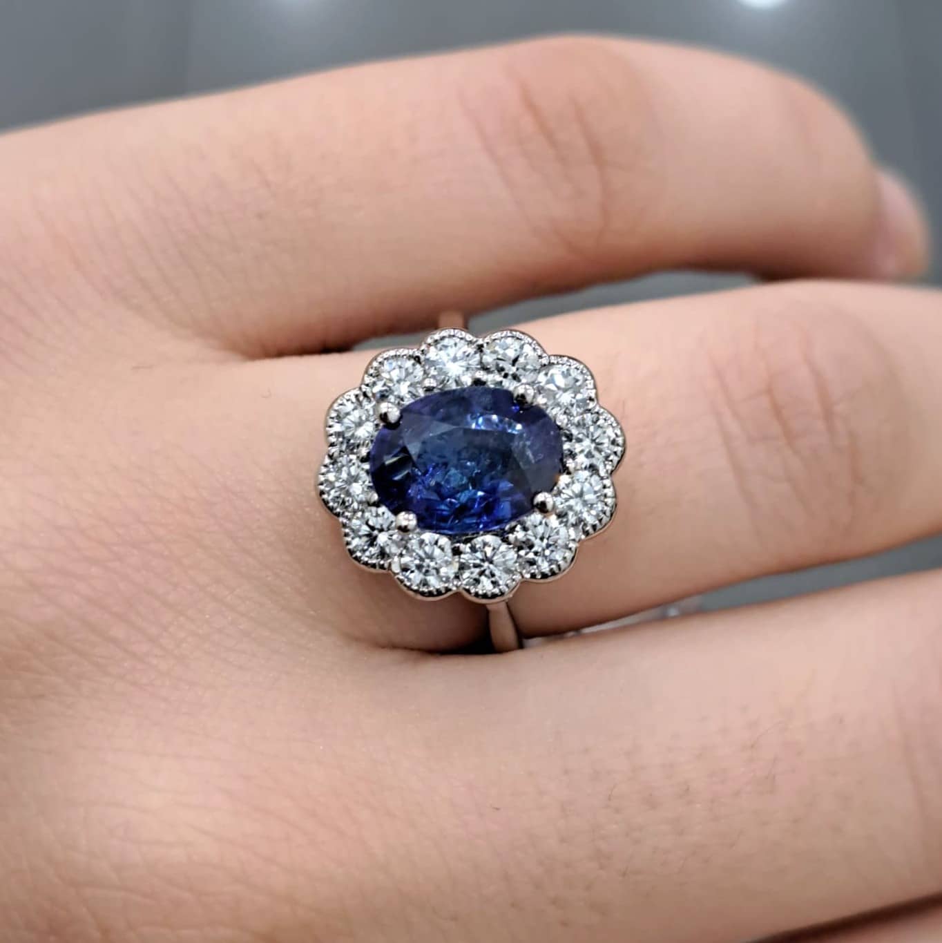 3.50CT SAPPHIRE OVAL & DIAMOND CLUSTER ENGAGEMENT RING IN PLATINUM