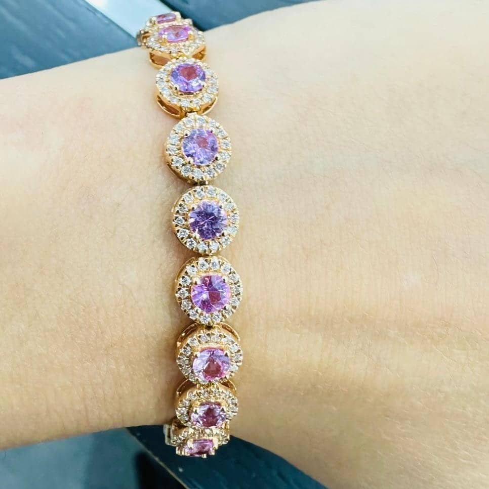 7.30 CARAT ROUND PINK SAPPHIRE AND DIAMOND HALO SET BRACELET IN 18K ROSE GOLD