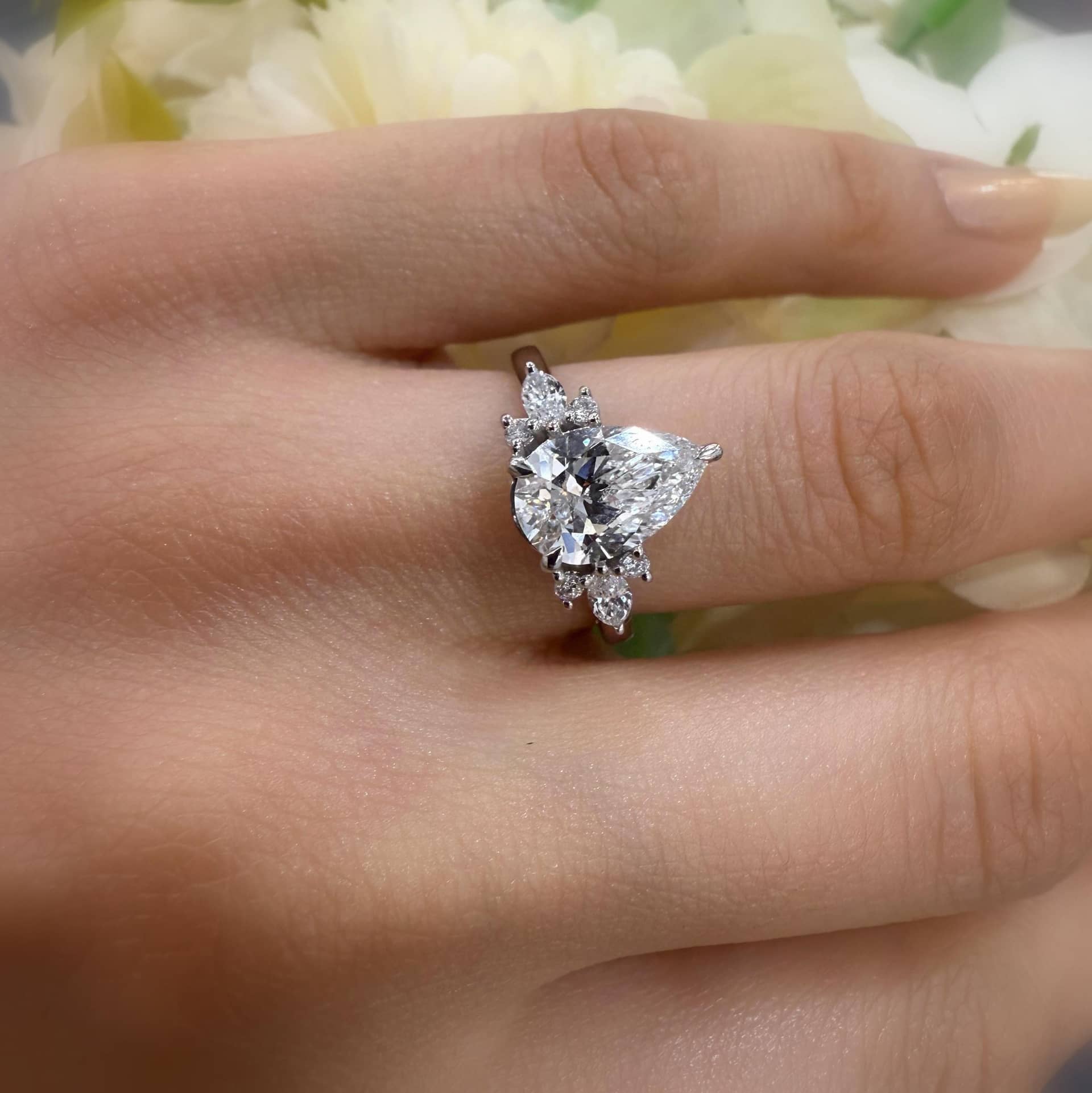 IGI CERTIFIED 2.00CT E/VS LAB GROWN PEAR AND SIDE DIAMOND ENGAGEMENT RING IN PLATINUM