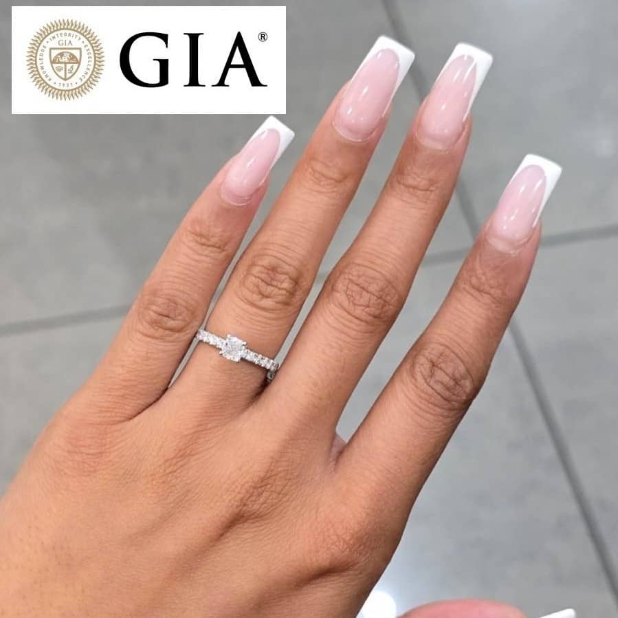 GIA Certified 0.75CT E/VS Cushion and Side Diamond Hidden Halo Ring in Platinum