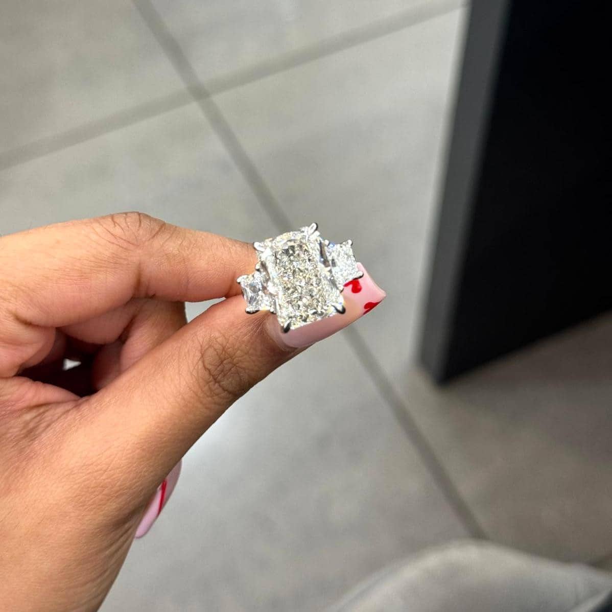 IGI LAB GROWN 11.03CT RADIANT WITH SIDE TRAPOZOID TRILOGY RING IN PLATINUM