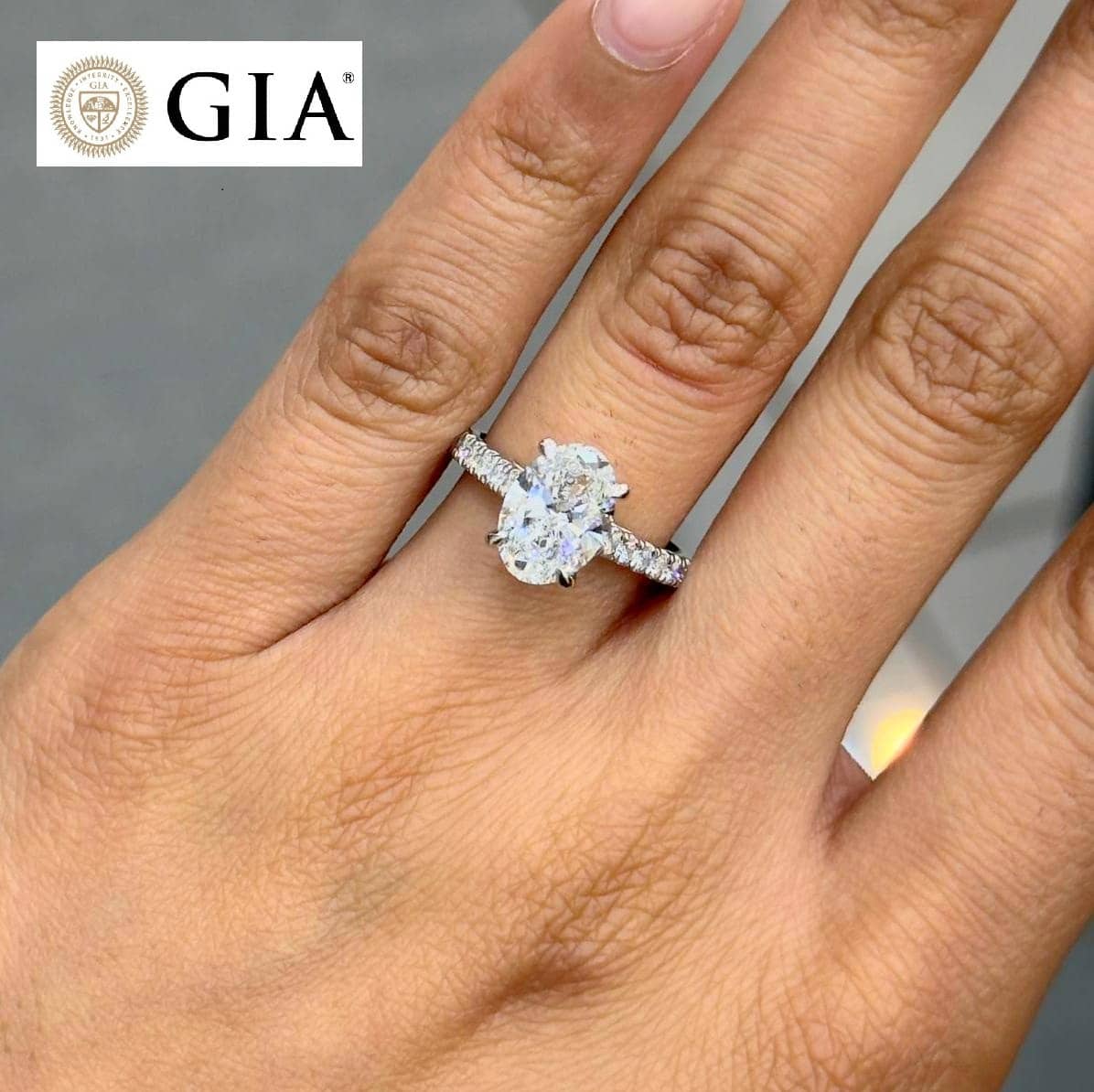 GIA CERTIFIED 1.80CT OVAL WITH SIDE DIAMOND ENGAGEMENT RING IN PLATINUM