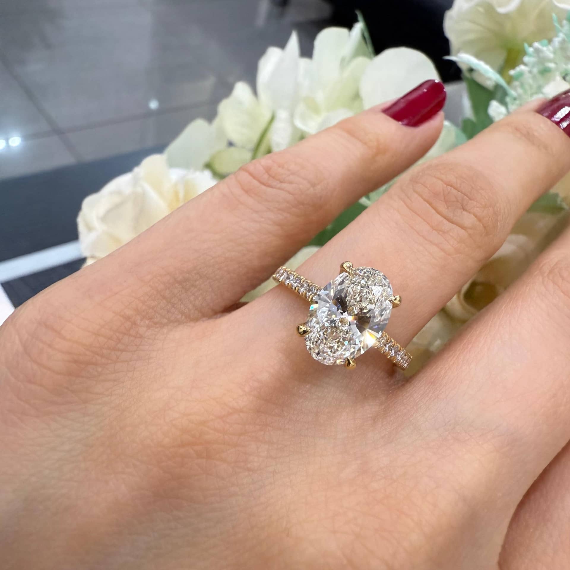 2.50CT E/VS LAB GROWN OVAL WITH SIDE DIAMOND HIDDEN HALO ENGAGEMENT RING IN 18K YELLOW GOLD