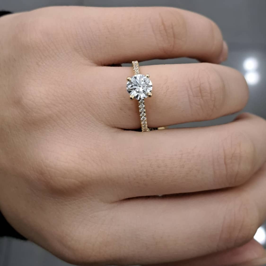 Four Claw Round Diamond Engagement Ring