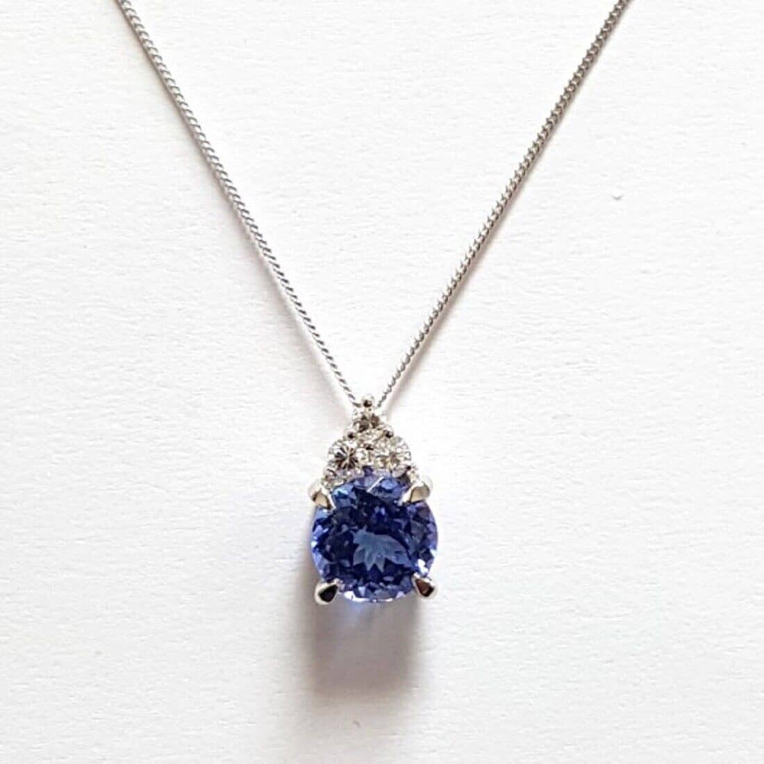 AAA 8.7*6.3MM 1.00ct Tanzanite & Diamond Pendant In White Gold Comes With Chain